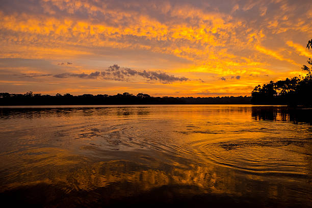 istock Tropical Sunset over the water 637992450