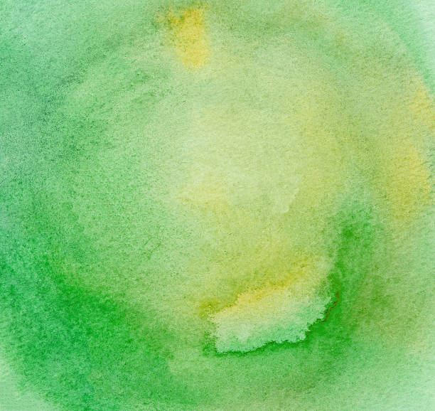 istock Abstract hand drawn watercolor background on textured paper in green 637999814