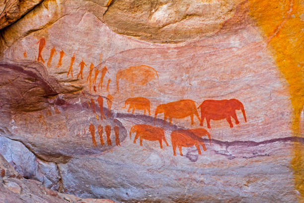 Rock Art Painting of Elephant and People South Africa Red Rock Art Painting of Elephant and People in Cederberg South Africa cederberg mountains photos stock pictures, royalty-free photos & images