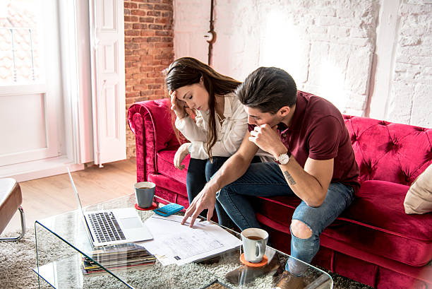 istock young married couple with finance problems and emotional stress 638001080
