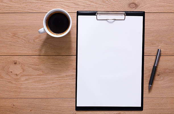 istock Mockup for checklist, note paper and coffee on wood background 638002692