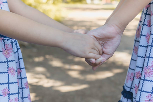 istock Selective focus little kids couple holding hands 638005508