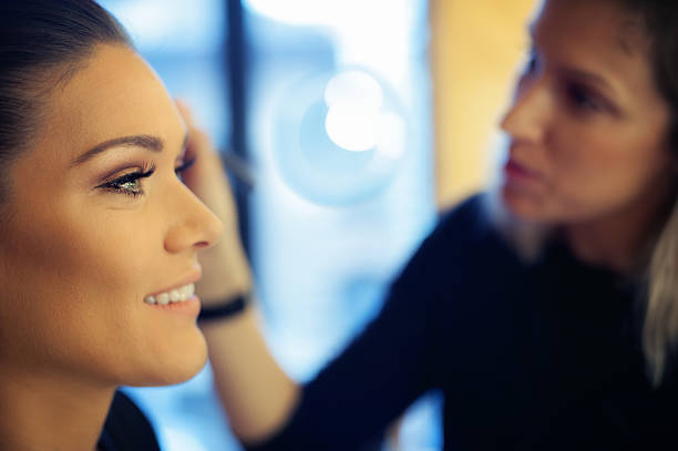 istock Makeup artist applies skintone 638005902