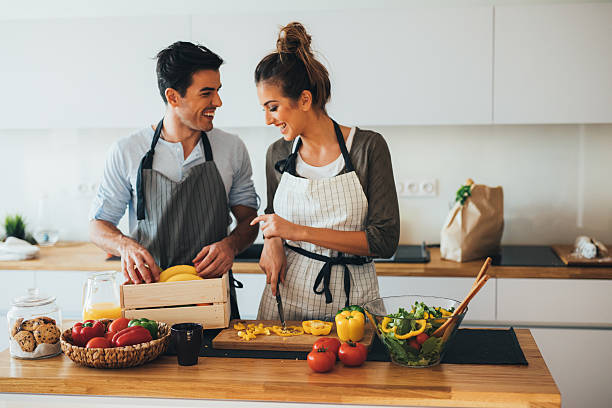 istock Young couple cooking in the kitchen 638005922
