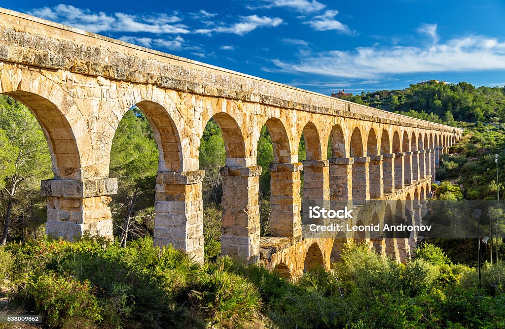 Les Ferreres Aqueduct, also known as Pont del Diable - Les Ferreres Aqueduct, also known as Pont del Diable. A part of the Roman aqueduct built to supply water to the ancient city of Tarraco - now Tarragona, Spain Aqueduct Stock Photo