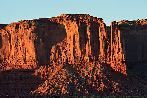 istock Lit up Rock Wall at Monument Valley 638013332