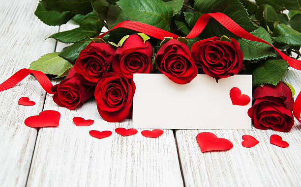 istock Red roses and greeting card 638015194
