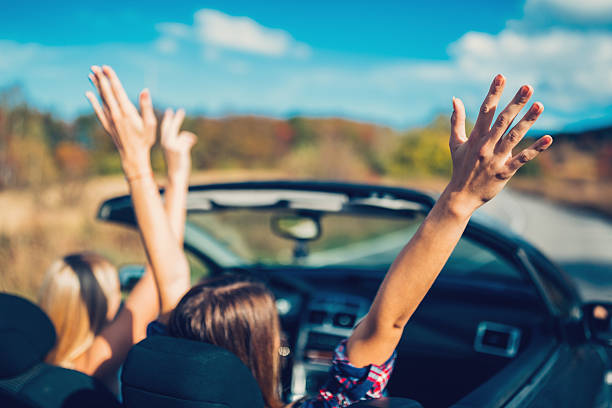 istock Young women traveling with car 638016332