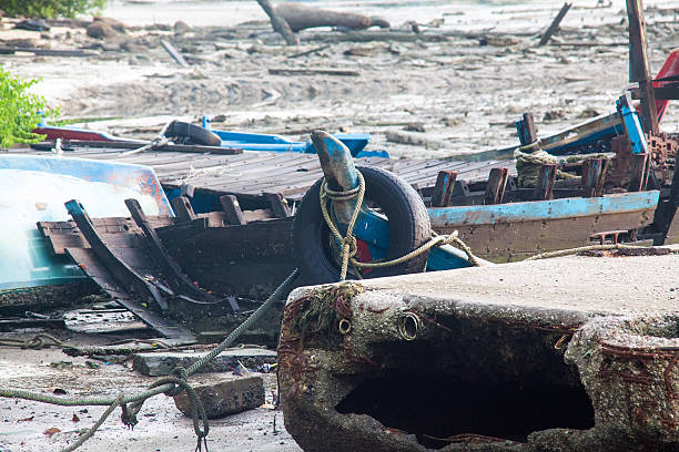 istock Broken abandoned fishing boat by the shore 638017170