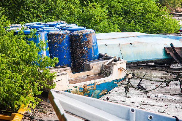 istock Broken abandoned fishing boat by the shore 638017966