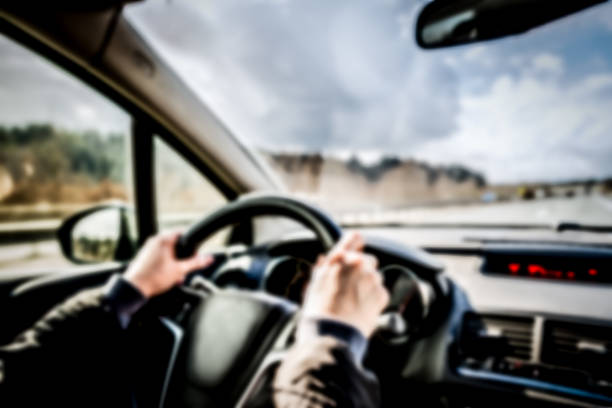 istock Woman driving a car 638018308