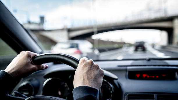 istock Woman driving a car 638018322
