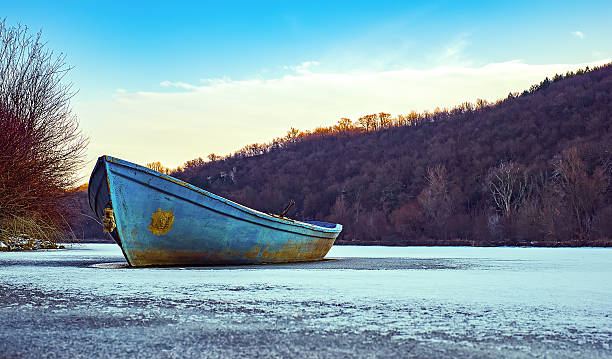 istock Blue fishing boat 638021734