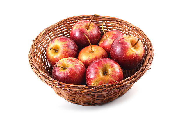 istock Little apples on wicked plate 638023926