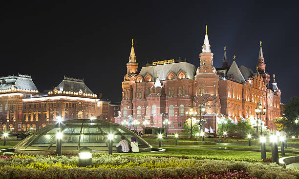 Moscow, Russia - August 22, 2015: State Historical Museum at night. Moscow, Russia. On the street are tourists and residents of the city