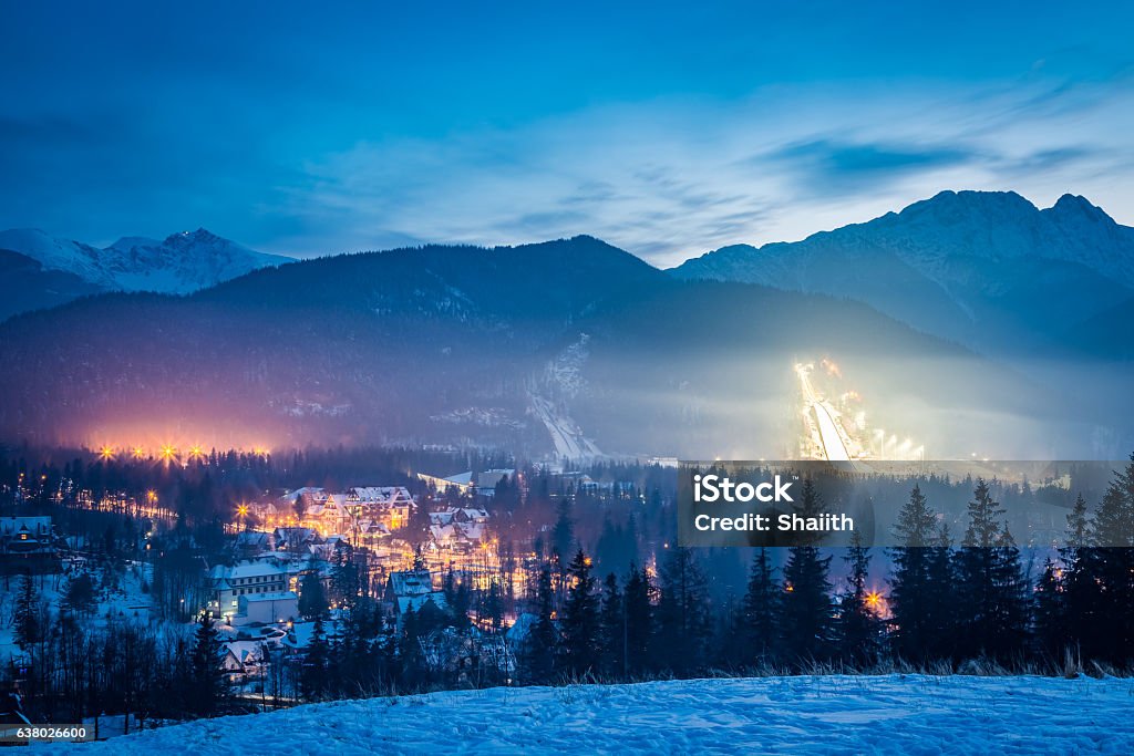 Skiing competitions in Zakopane in winter at dusk in Poland Beauty Stock Photo