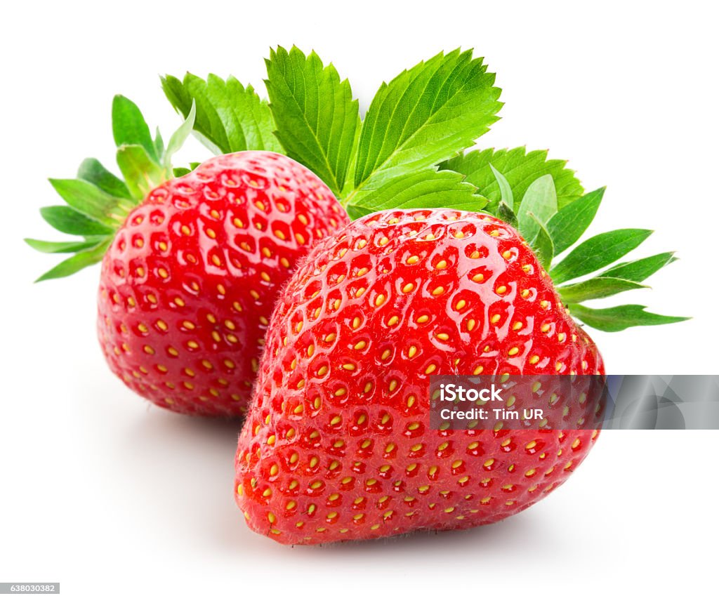 Strawberry. Two berries with leaves isolated on white background. Strawberry Stock Photo