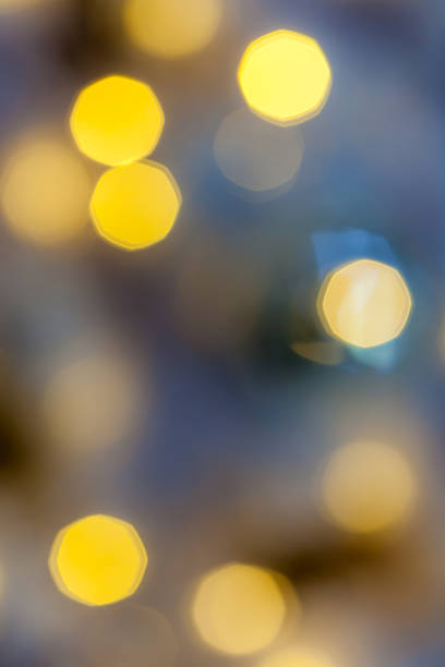 istock Abstract background of blurred golden light bokeh circles. 638032322