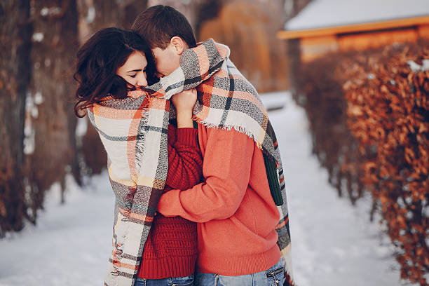 istock Couple love snow and cold 638035316