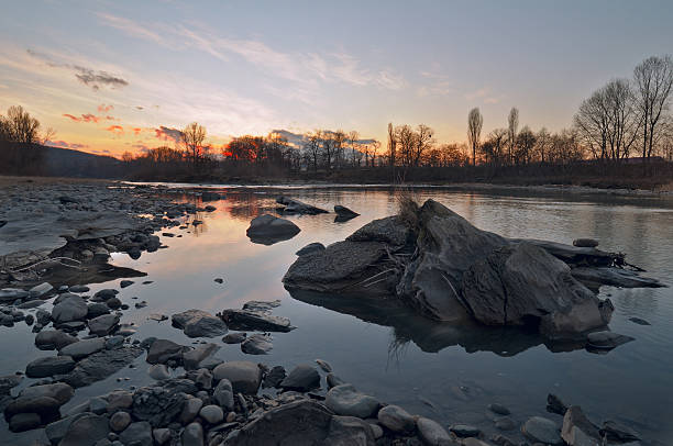 istock River landscape with rocks in the foreground. The evening, after 638035878