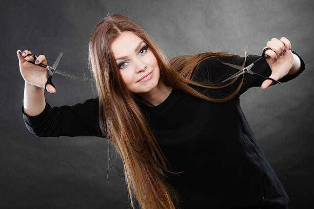 istock Female hairstylist barber with scissors. 638037218