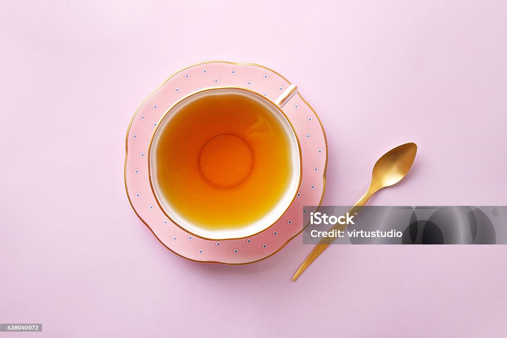 Tea cup on pastel pink background. Top view Tea - Hot Drink Stock Photo