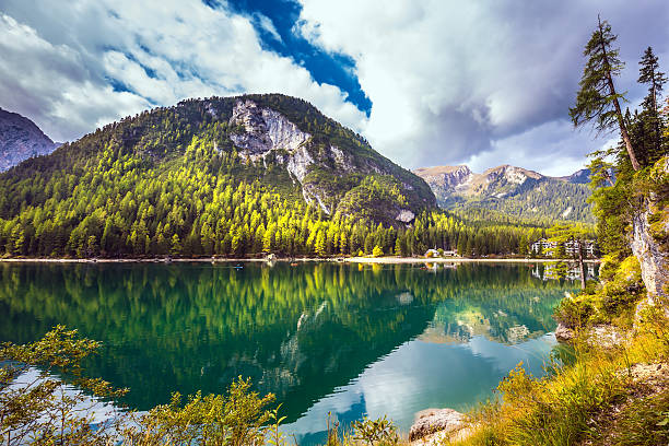 istock The water reflects forest and mountains 638041962