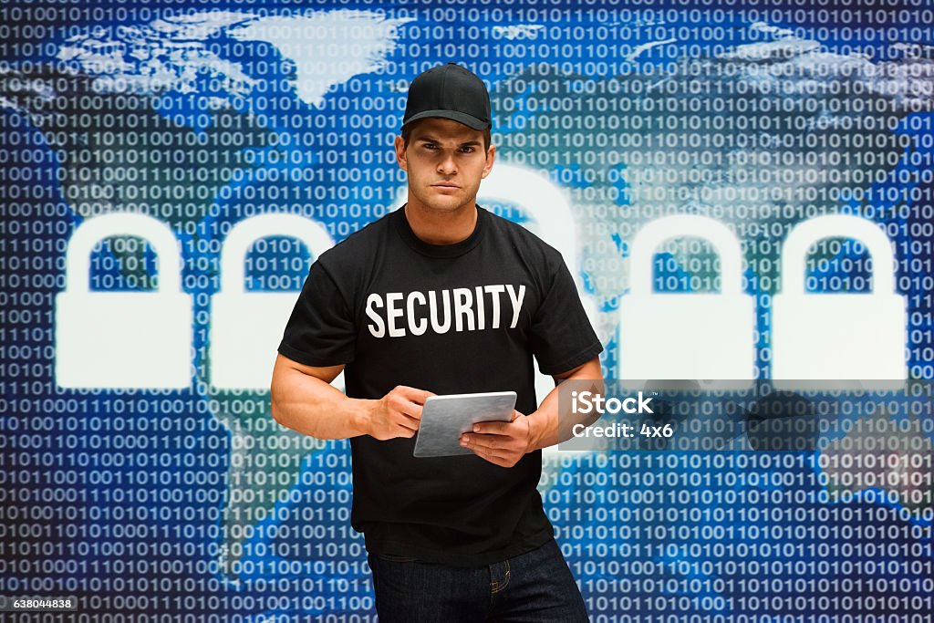 Security Guard Using Tablet Stock Photo - Download Image Now - 20-29 ...