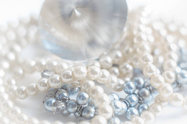 istock Abstract blurred background, pearl necklace on white. 638046602
