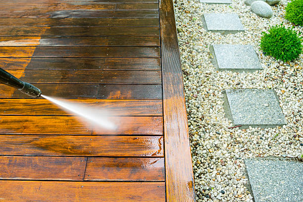 cleaning terrace with a pressure washer