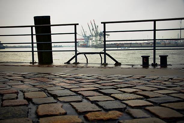 Cobblestones in the focus of the Port of Hamburg, from the fish market.