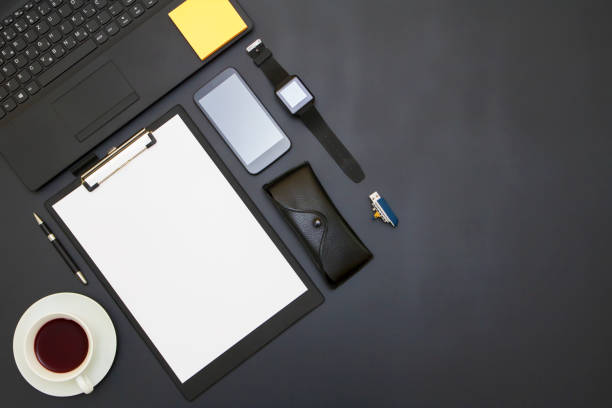 istock Black office table with supplies. Top view with copy space 638055960