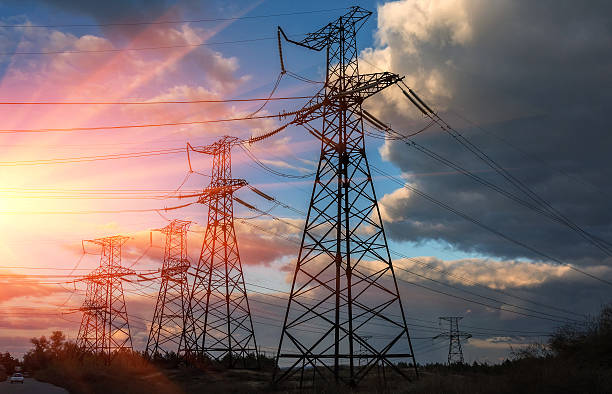istock high voltage electric transmission tower at sunset. 638056438