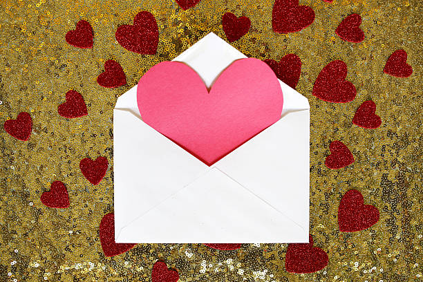 istock Envelope with Valentine's Day Heart Note and Confetti 638056926