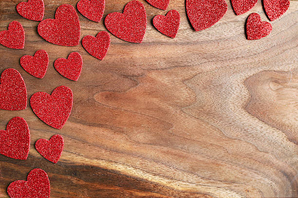red sparkle valentine's hearts border cherry wood grained background - cherry valentine stok fotoğraflar ve resimler