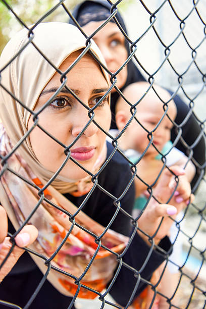 istock Sad refugee Middle eastern women (Real People) 638061060