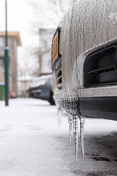 istock Winter Art, icicles on cars. 638061276