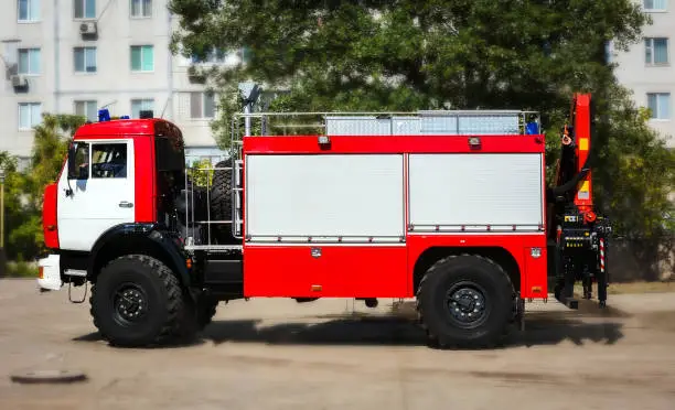 big red fire truck with special equipment.