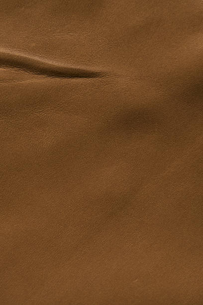 istock Natural old vintage light brown leather texture. 638061924