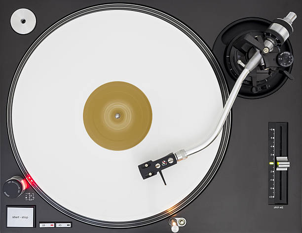 istock DJ Turntable with White Vinyl Record, Playing, Top View 638063032