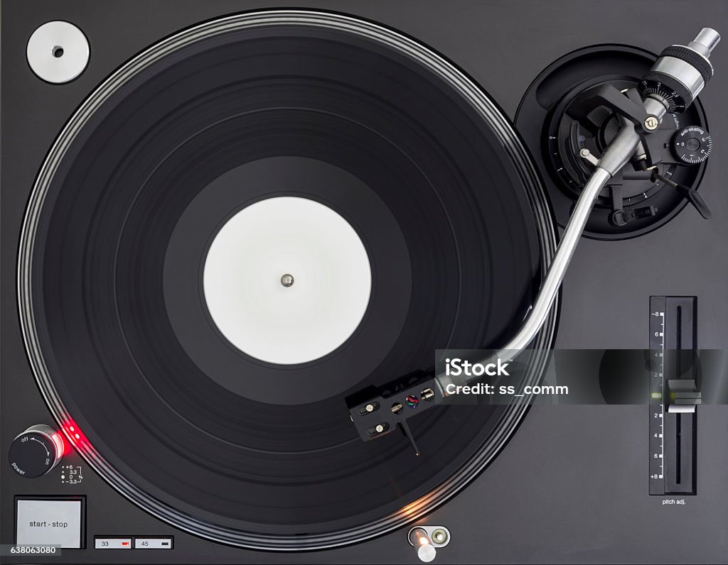 DJ Turntable with Vinyl Record, Playing, Top View Professional Music Equipment For DJ, Live Performance, Scratch and Playing Vinyl Records Turntable Stock Photo