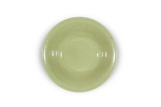 istock Soup green plate on white background from above 638068710