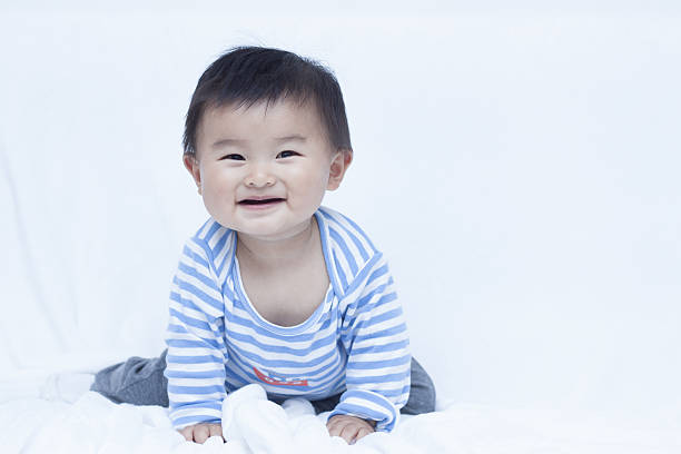 istock Cute Chinese baby boy in sailor suit 638069218