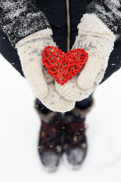 istock Rattan red heart in hands 638069634