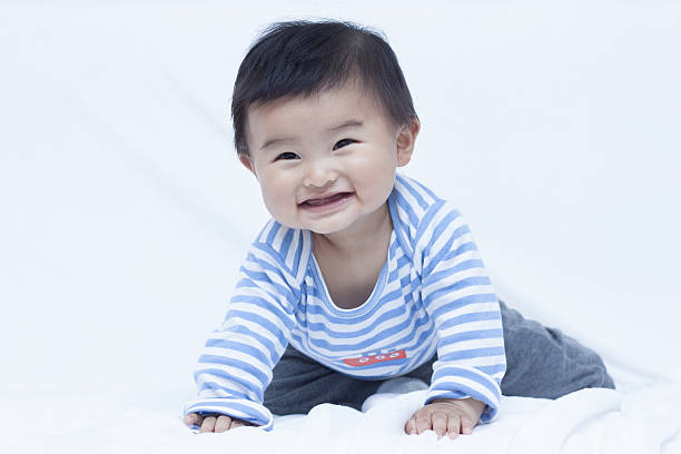 istock Cute Chinese baby boy in sailor suit 638070004