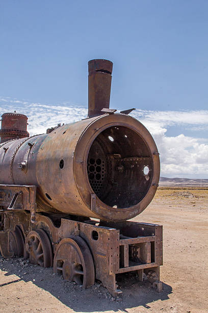 Uyuni, Bolivia- October 29, 2016: An old and rusty locomotive in the desert of Uyuni. The rusty steel is covered with some  graffiti