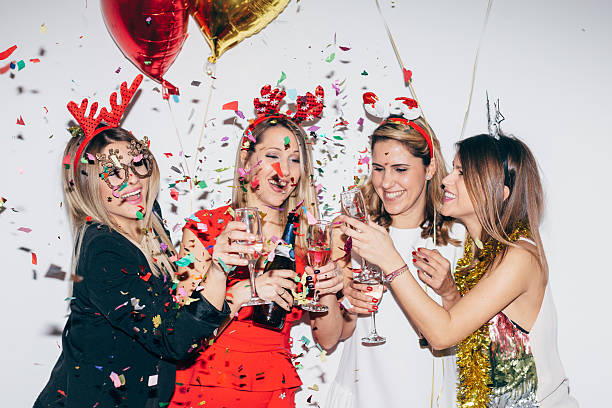 New Year's party Four young woman celebrating and having fun 3686 stock pictures, royalty-free photos & images