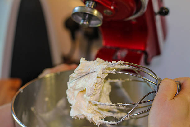 istock Holding whisk full of cream 638072028