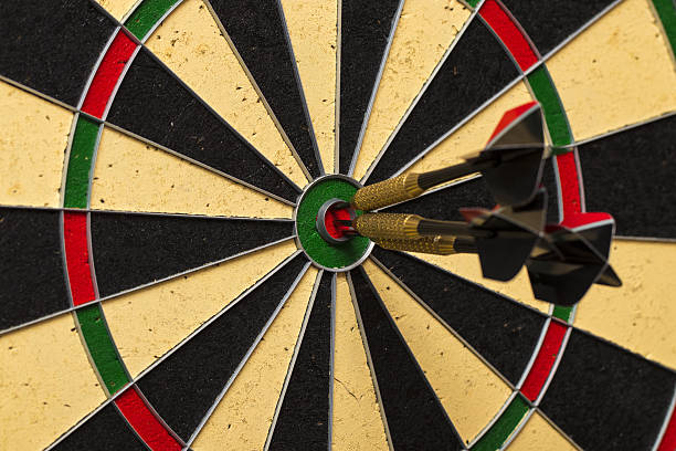 istock Dart arrows hitting in the target center 638072292