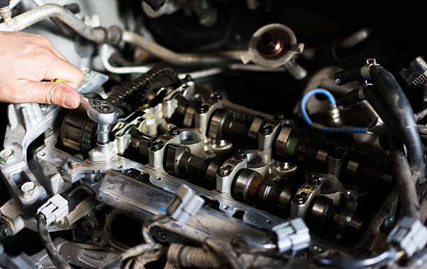 istock Car mechanic repairing an internal combustion engine. 638074126
